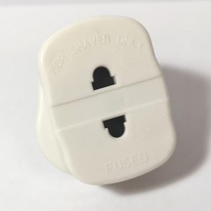 A white 1 amp shaver and toothbrush adaptor plug