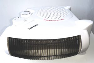 A White body Upright fan heater with optional cool or hot air flow settings.